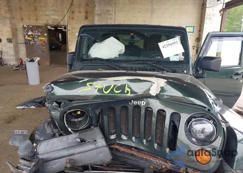 2011 Jeep Wrangler Unlimited Sahara from USA, damaged, VIN 1J4HA5H15BL520300